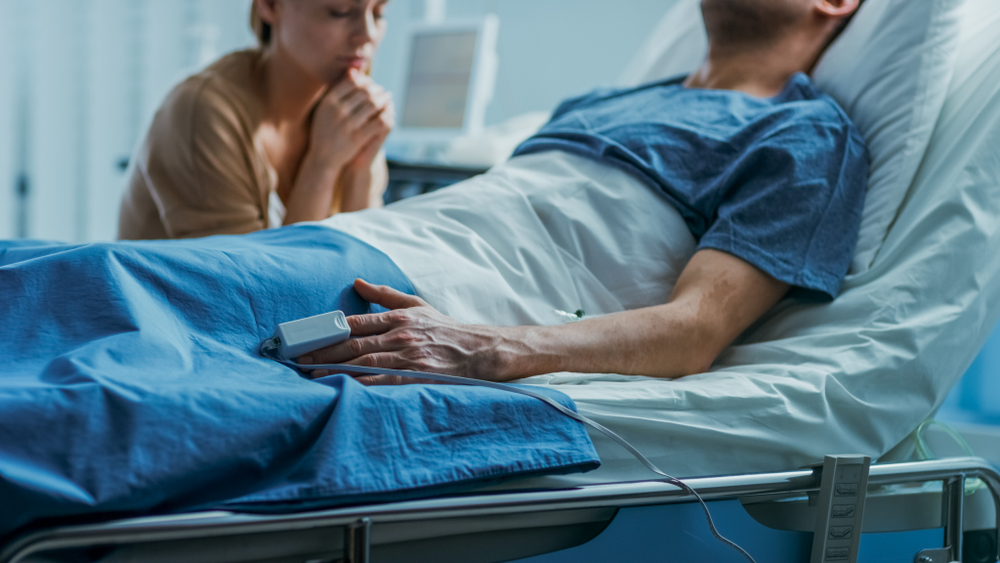 Man On Hospital Bed